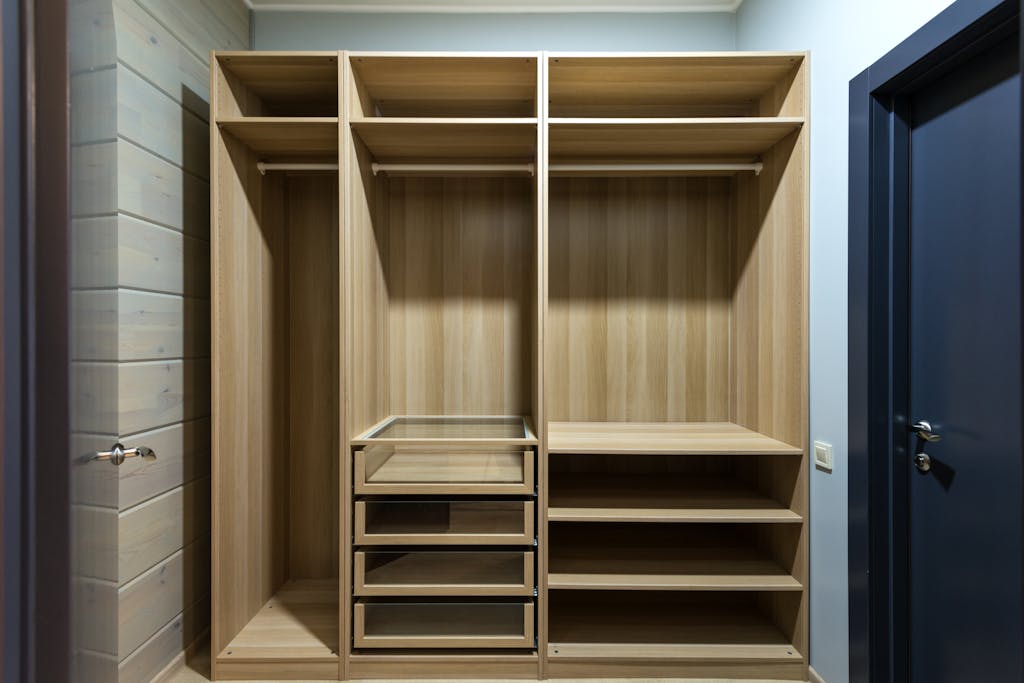 wooden wardrobe with shelves and drawers