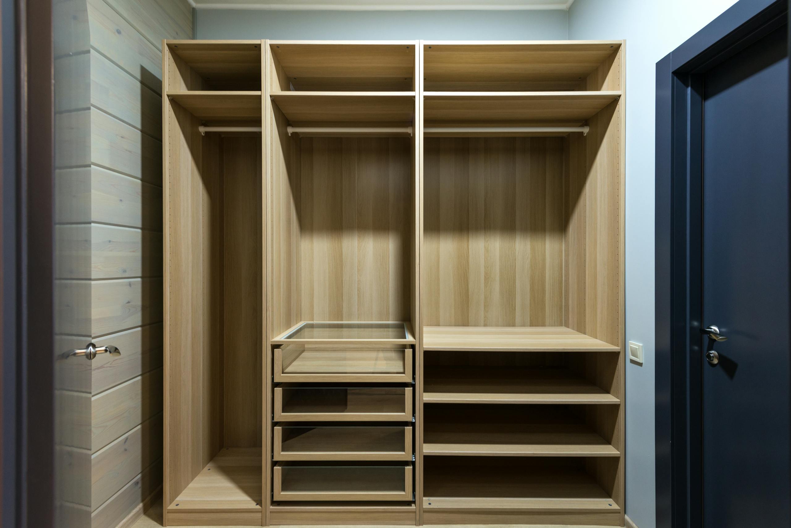 wooden wardrobe with shelves and drawers